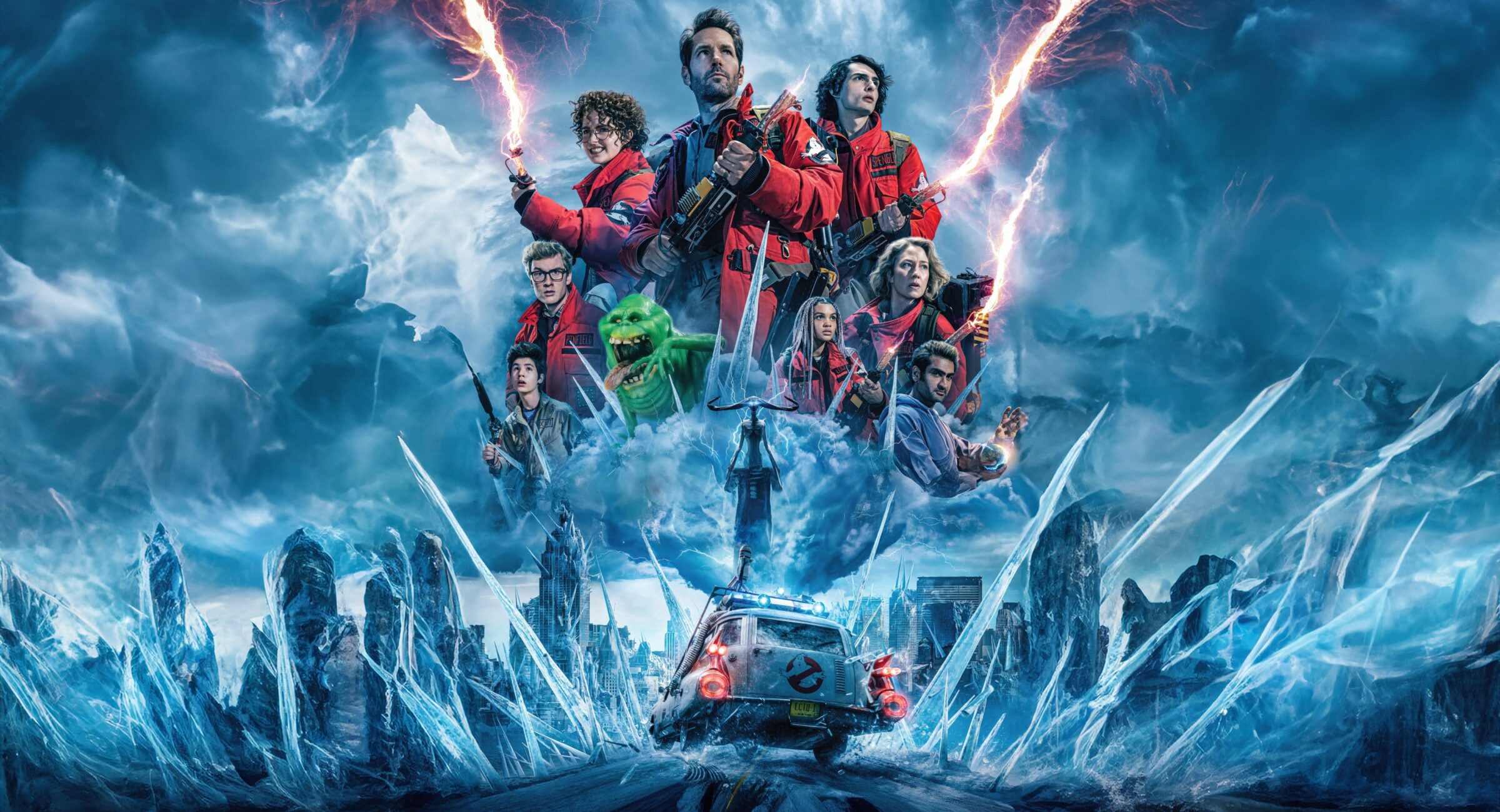 The poster for Ghostbusters: Frozen Empire shows the main characters in red Ghostbusters uniforms, holding proton packs with energy beams. They stand above the Ecto-1 car, driving through an icy landscape with jagged ice formations. A stormy sky looms in the background, and the ghost Slimer appears among them. The poster suggests an action-packed, supernatural adventure.